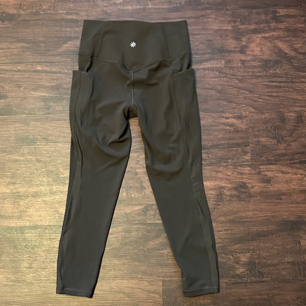 Athleta salutation stash mesh 7/8 tight. Brownish-ish in color.
